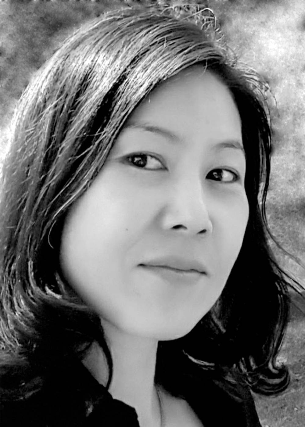 Black and white headshot of Emily Won