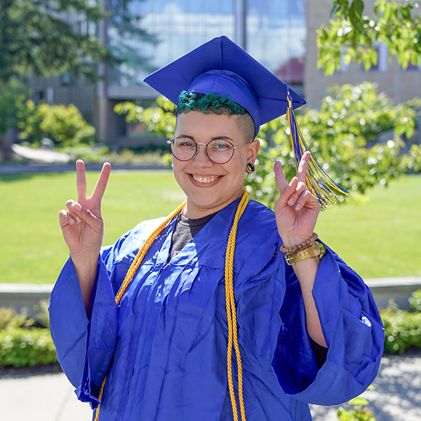 Grad in blue regalia