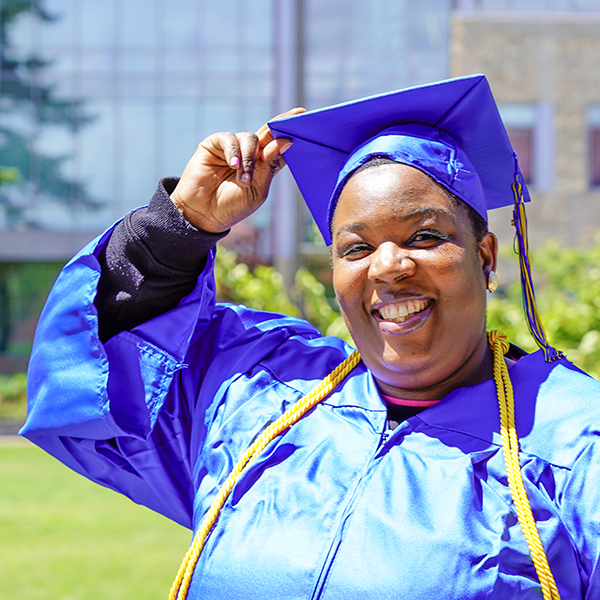 grad in blue regalia