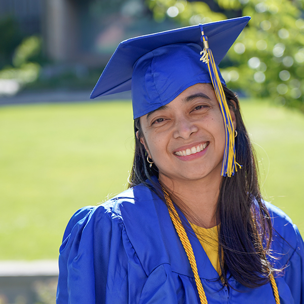 grad in blue regalia