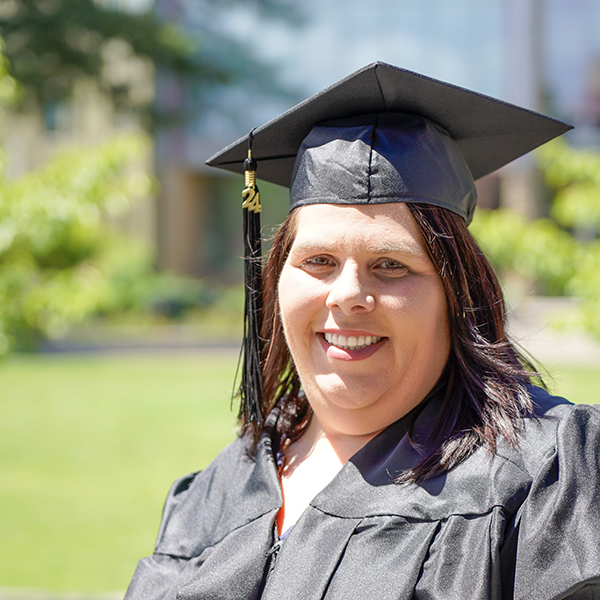 grad in black regalia