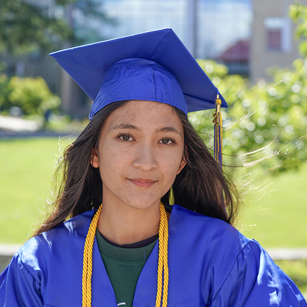 grad in blue regalia