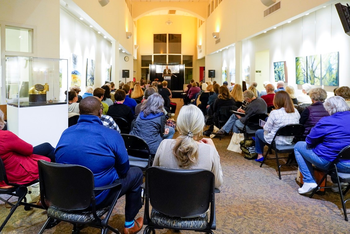 audience watching speaker