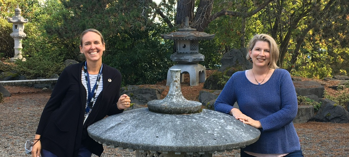 Alisa Ulferts Birkenstein and Michelle Butler, women standing in the TCC Japanese Garden